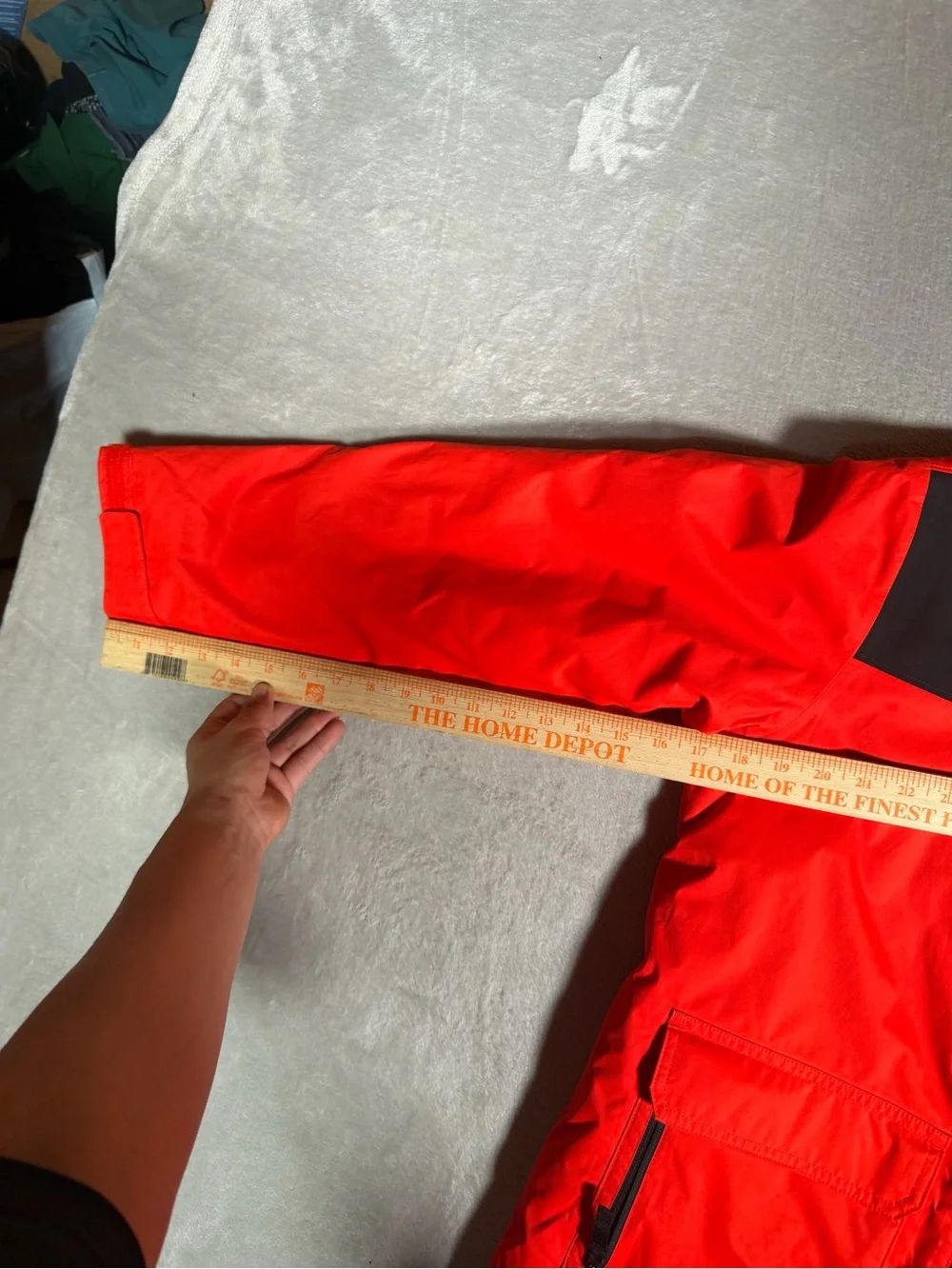 The North Face Red and Black Hooded Raincoat with Patterned Lining